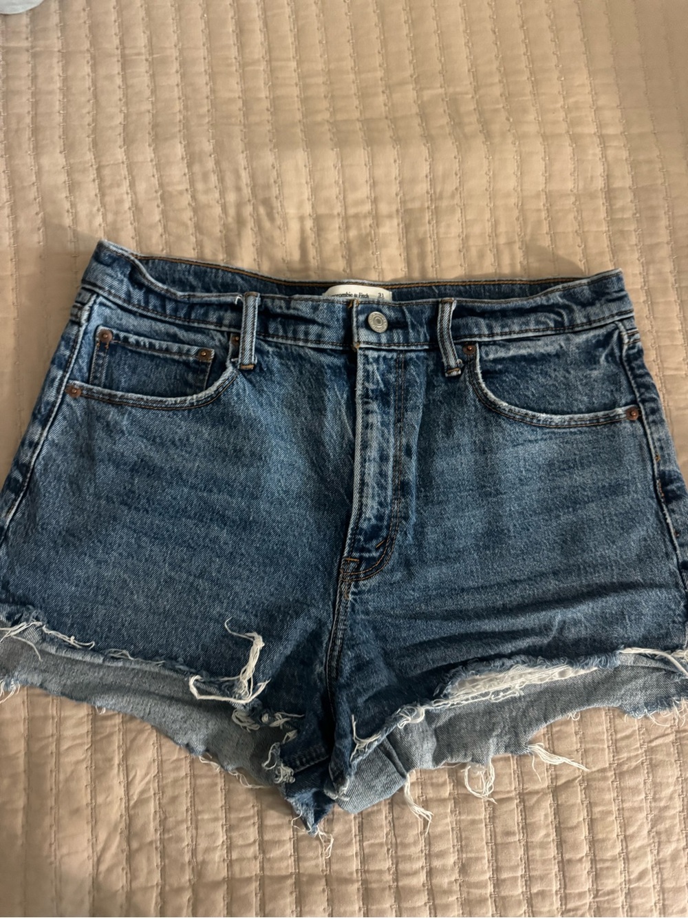 Abercrombie & Fitch High-Rise Frayed Denim Shorts in Blue